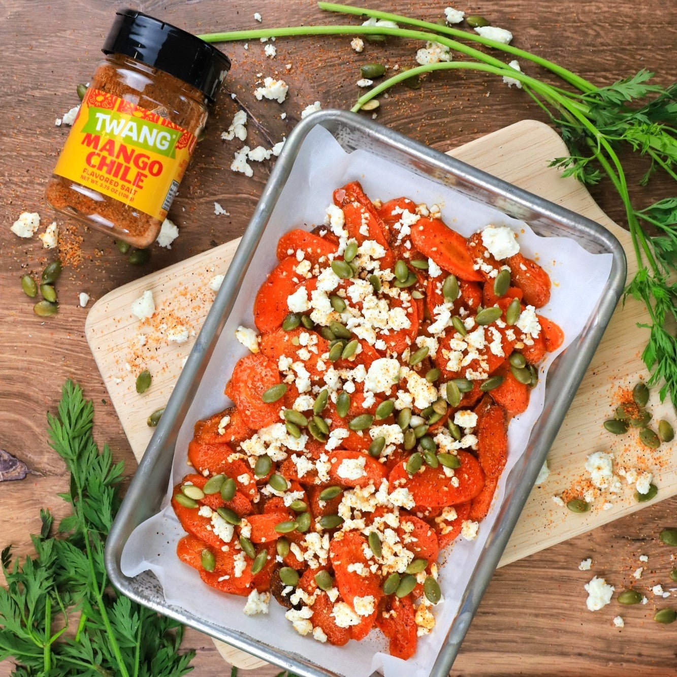 Mango Chile Glazed Carrots with Feta & Pepitas - Twang
